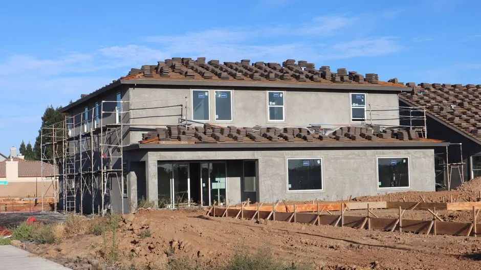 Storm-damaged shingle roof replaced